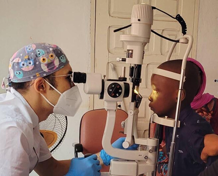 Eye examination during a cataract care session in Mali